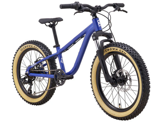 Blue children's bike with large tires on a white background